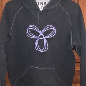 Women’s TNA Aritzia sweater. Dark grey with lavender logo.